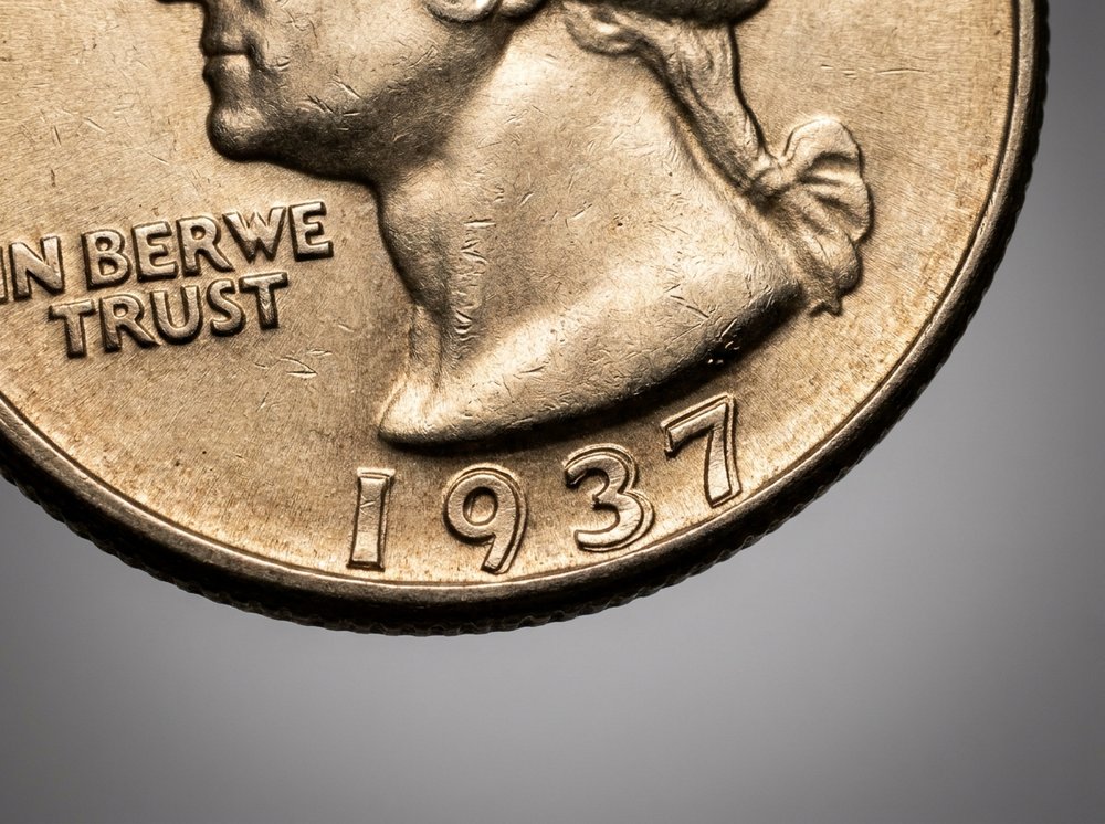 Close-up of 1937 doubled die obverse Washington quarter showing doubling on date and lettering